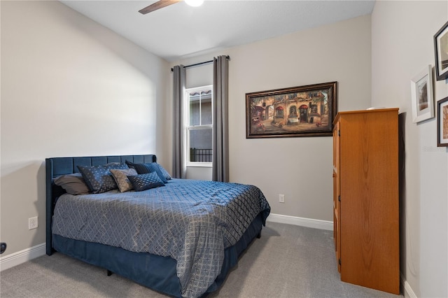 bedroom featuring ceiling fan and carpet flooring