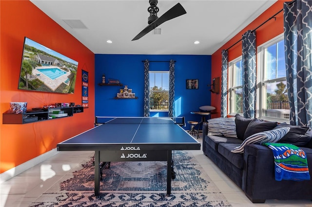 playroom with light tile patterned floors and ceiling fan