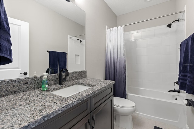 full bathroom featuring vanity, toilet, tile patterned flooring, and shower / bath combo with shower curtain