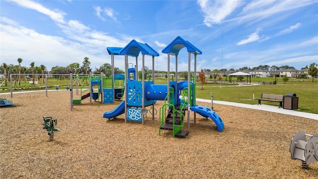 view of play area featuring a lawn