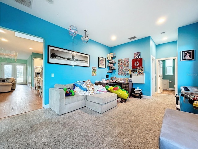 13653 Heritage Way, Sarasota, FL 34240 - carpeted living room with french doors