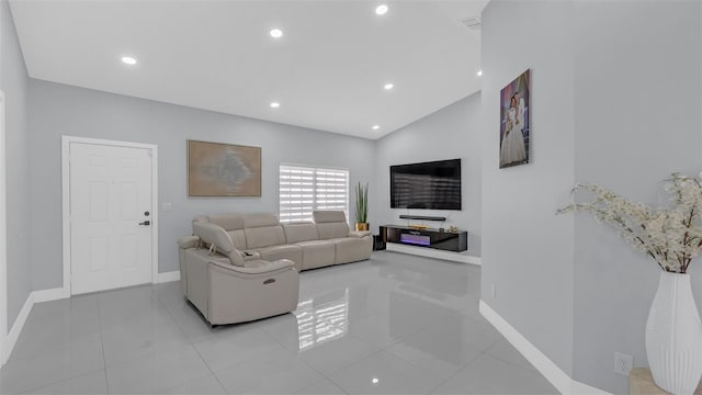 living room with vaulted ceiling