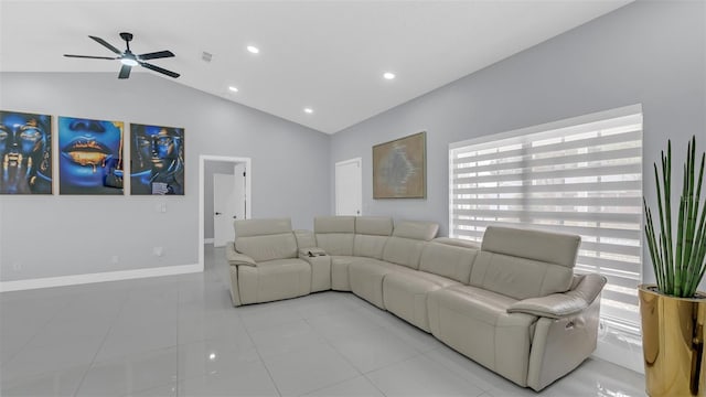 living room featuring ceiling fan, lofted ceiling, and light tile patterned floors