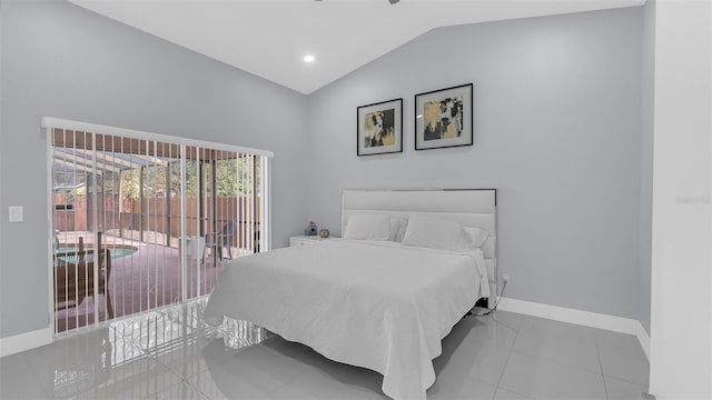 bedroom featuring access to exterior, light tile patterned floors, and vaulted ceiling