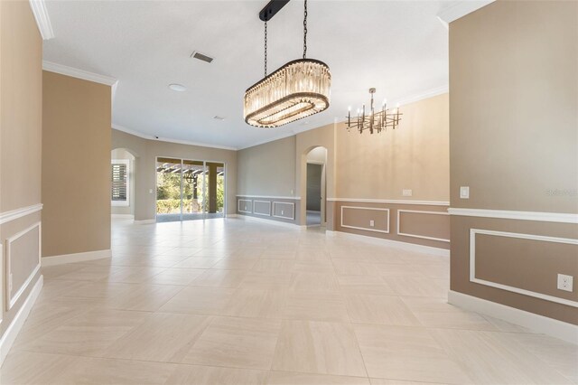 empty room featuring ornamental molding, a chandelier, and light tile patterned flooring