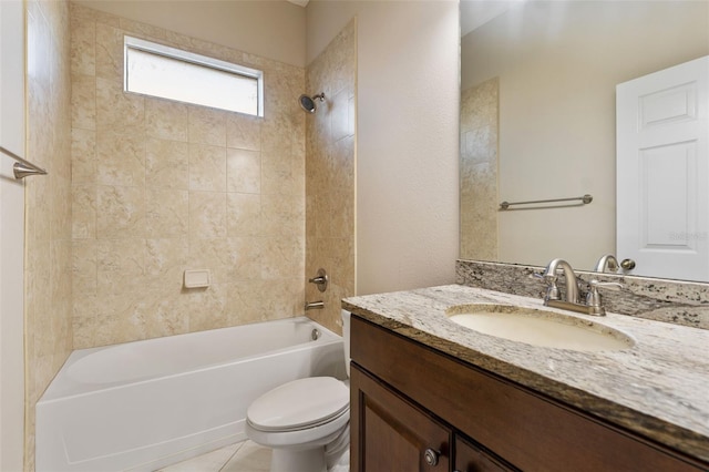 full bathroom with tiled shower / bath combo, vanity, and toilet