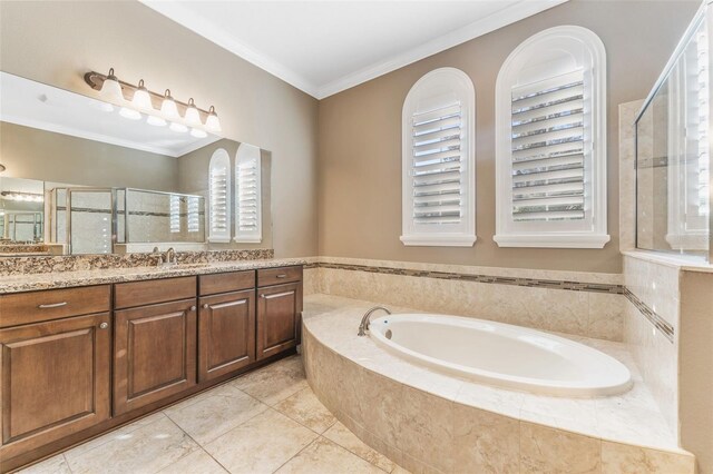 bathroom featuring vanity, tile patterned flooring, crown molding, and plus walk in shower