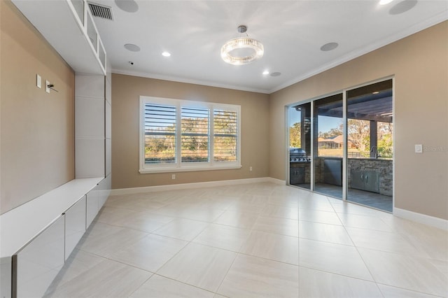 unfurnished room featuring crown molding, a wealth of natural light, and light tile patterned flooring