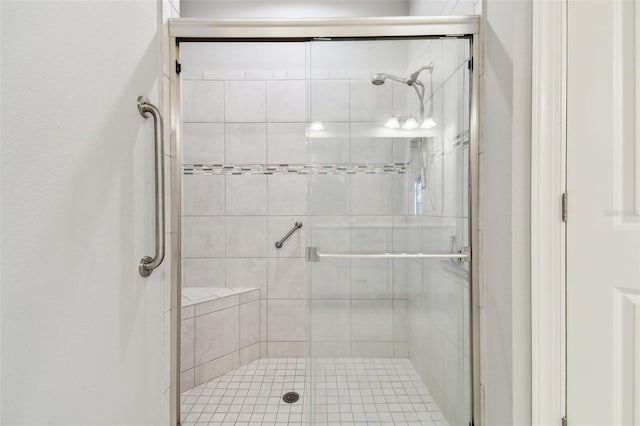 bathroom with a stall shower