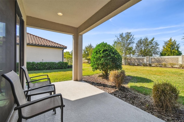 view of patio with fence