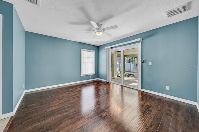 unfurnished room featuring hardwood / wood-style floors, a textured ceiling, and ceiling fan