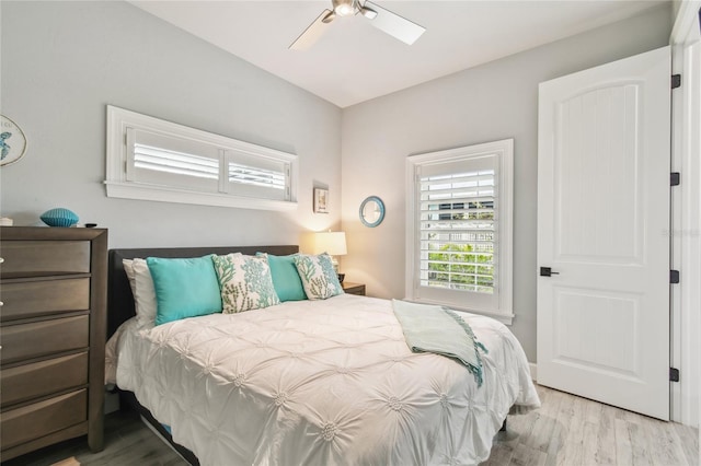 bedroom featuring ceiling fan and light wood-type flooring