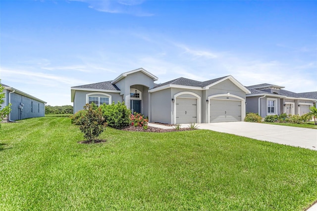 single story home with a garage and a front yard