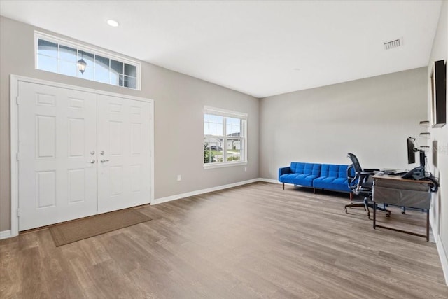 foyer entrance featuring light wood-type flooring