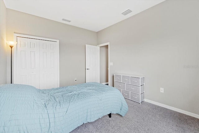 carpeted bedroom featuring a closet