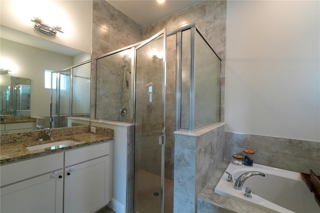 bathroom with vanity and plus walk in shower