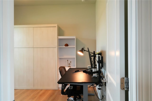 office area with light hardwood / wood-style flooring