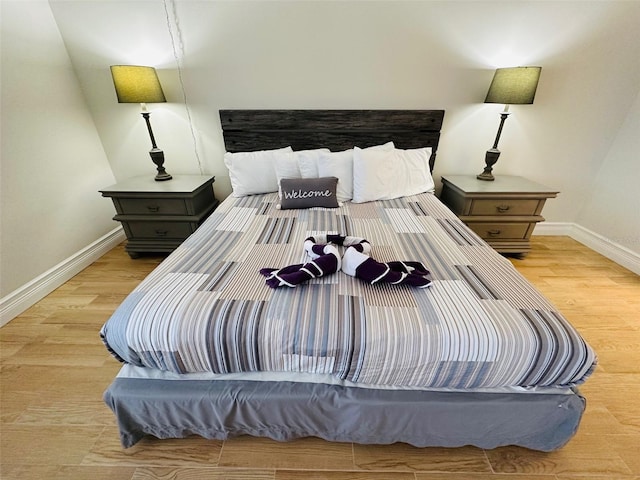 bedroom with light wood-type flooring