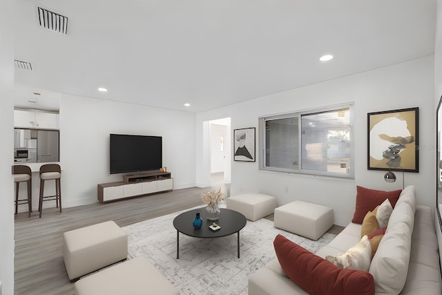 living room featuring light hardwood / wood-style flooring