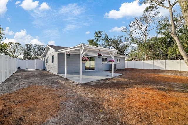 rear view of house featuring a patio area