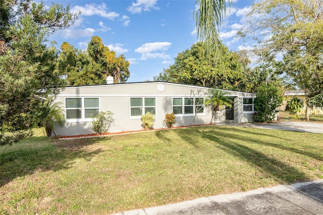 view of front of home with a front yard