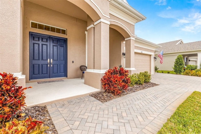 property entrance featuring a garage