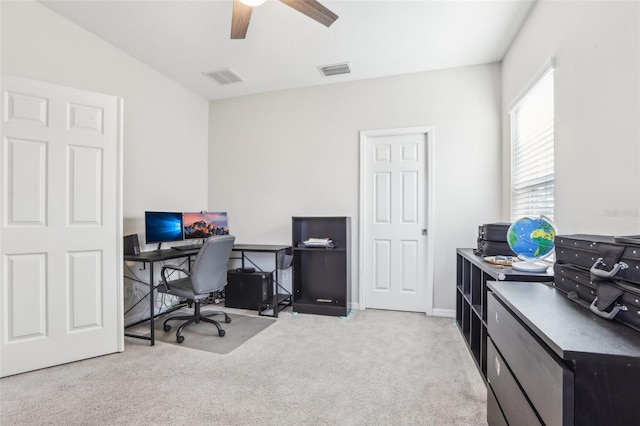 carpeted office with ceiling fan