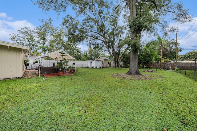 view of yard with a shed