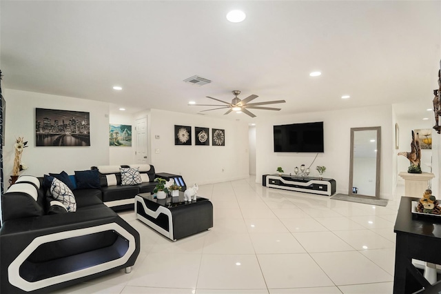 living room with light tile patterned floors and ceiling fan