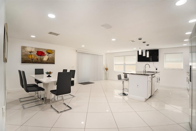 dining room featuring light tile patterned floors