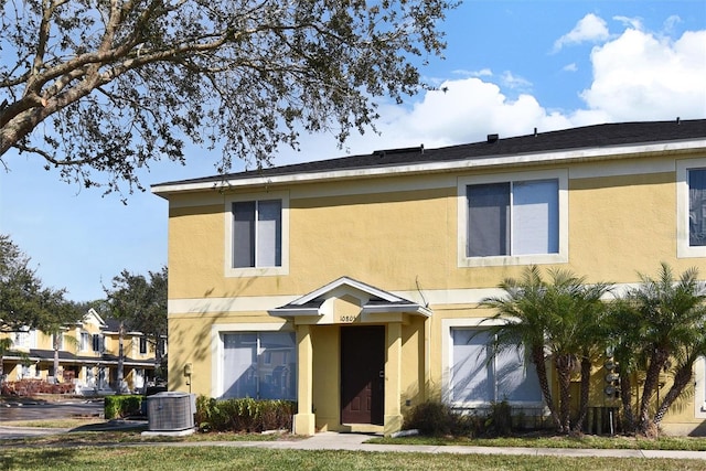 view of front of house with central air condition unit