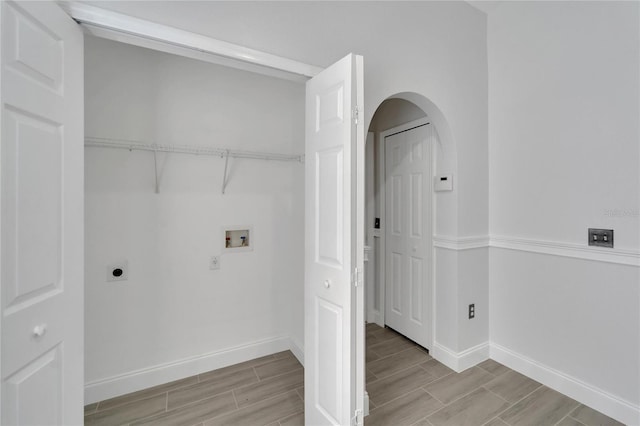 laundry area featuring electric dryer hookup and washer hookup