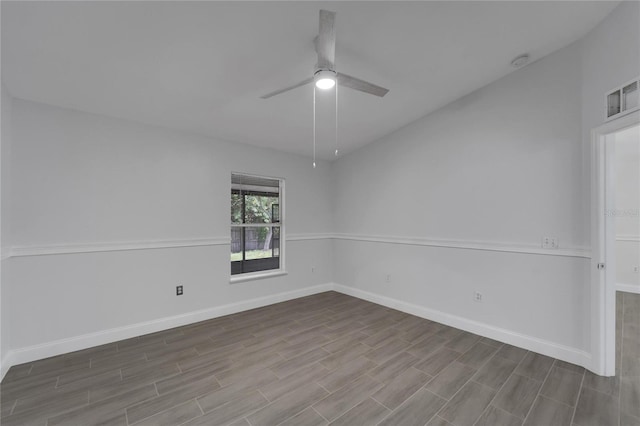 spare room with ceiling fan