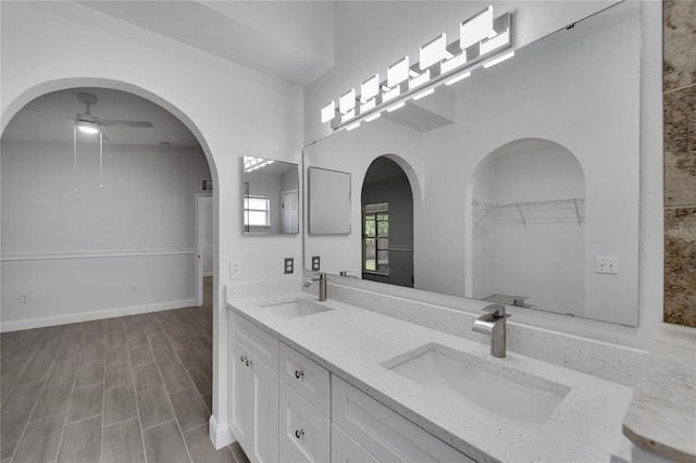 bathroom with vanity and ceiling fan