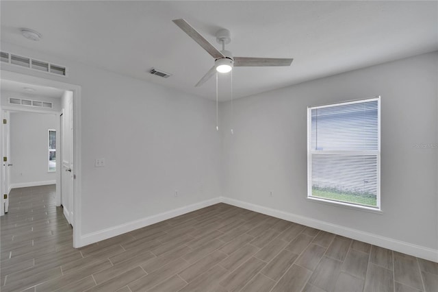 spare room with ceiling fan