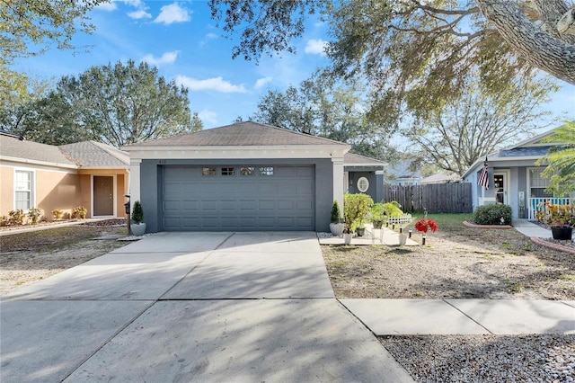 ranch-style home featuring a garage