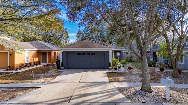 ranch-style house featuring a garage