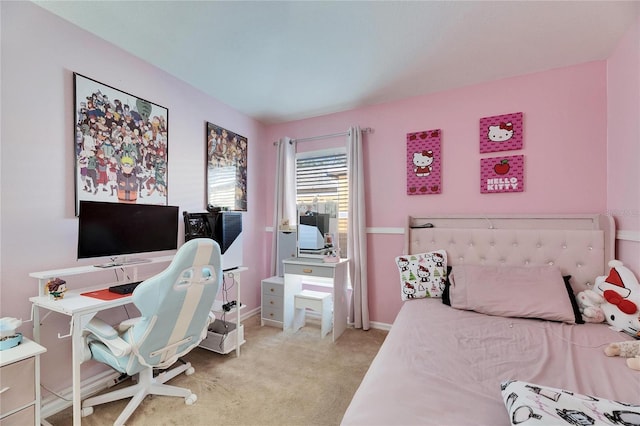 bedroom featuring light carpet