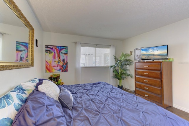 bedroom with a textured ceiling