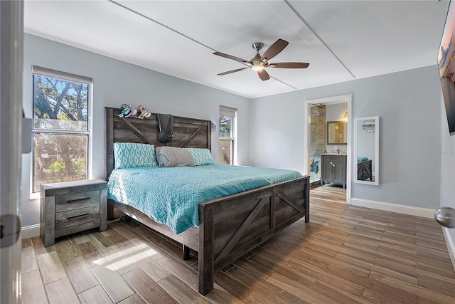 bedroom with ceiling fan and ensuite bathroom