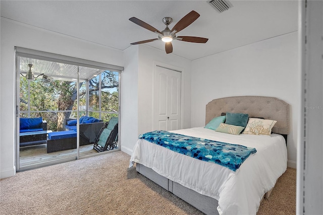 bedroom featuring ceiling fan, carpet floors, and a closet