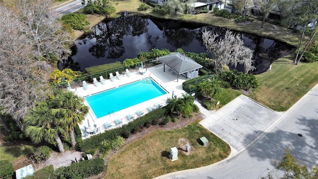 birds eye view of property featuring a water view