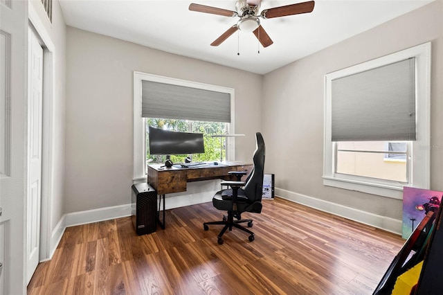 office area with hardwood / wood-style flooring and ceiling fan