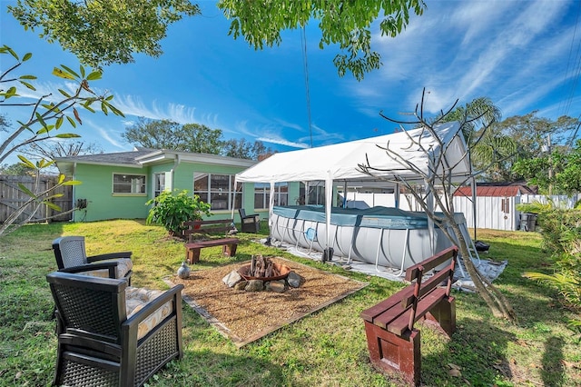 view of yard featuring a covered pool