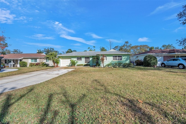 ranch-style house with stucco siding, driveway, a front lawn, and a garage