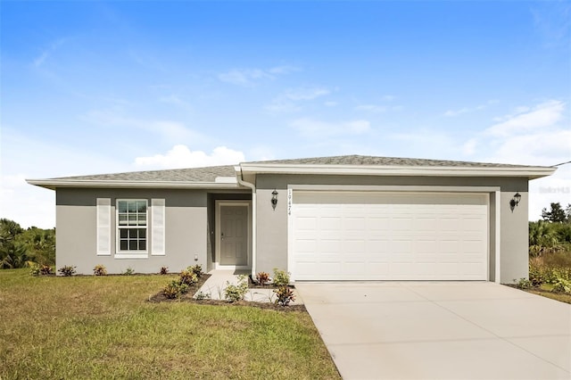 ranch-style home with a garage and a front yard