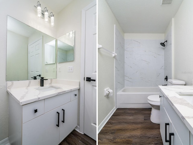 full bathroom featuring vanity, hardwood / wood-style flooring, toilet, and tiled shower / bath combo