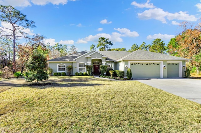 ranch-style home with a garage and a front yard