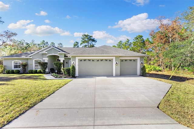 ranch-style home featuring a garage and a front yard