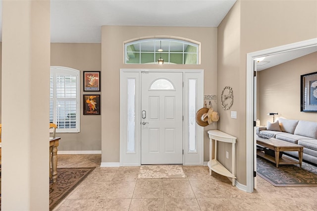 entrance foyer featuring light tile patterned flooring